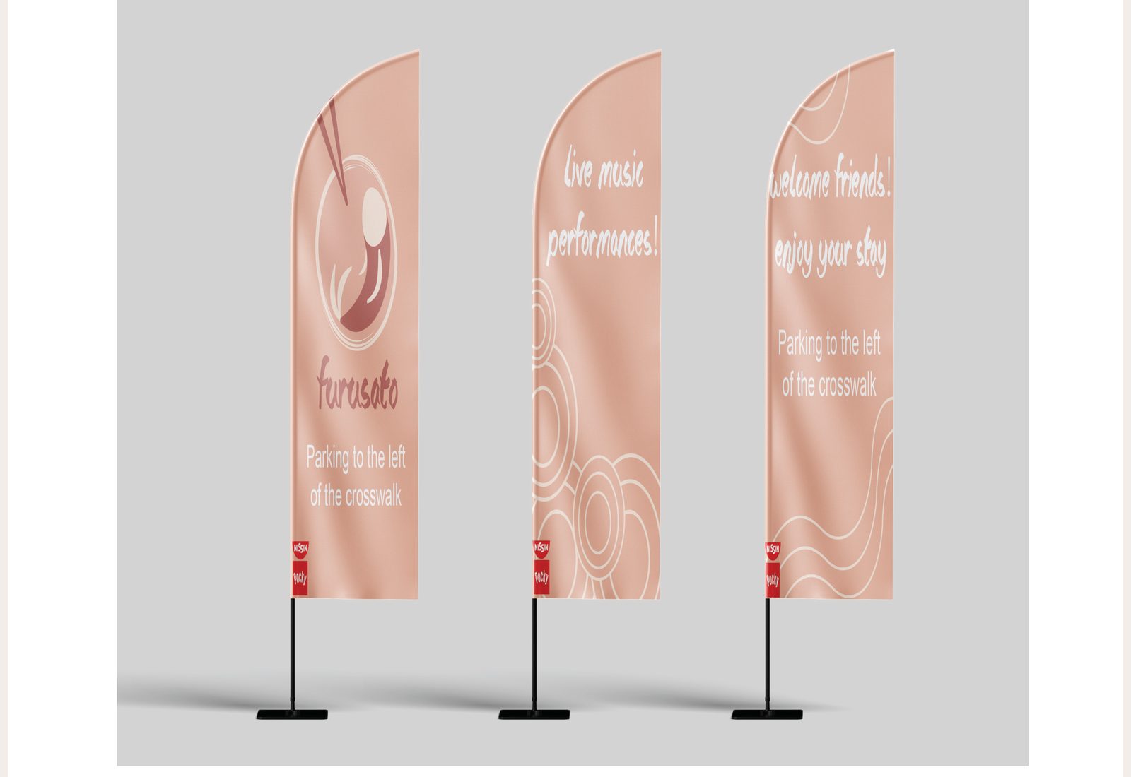 Furusato event banners — three feather flags with logo, music announcement, and welcome message in handwritten type